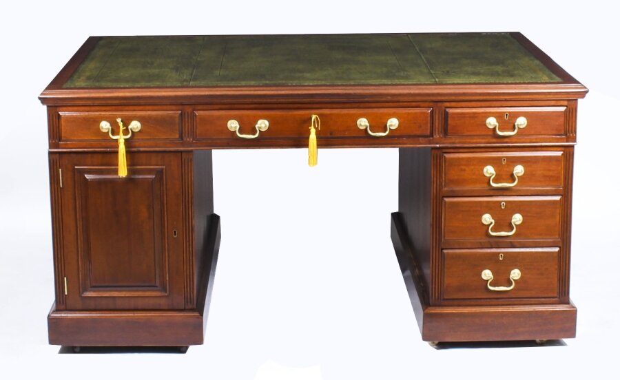 Celebrating the Craftsmanship of Antique Partners Desks
