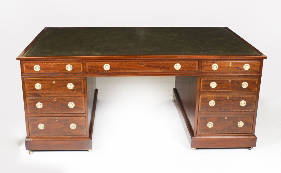 Celebrating the Craftsmanship of Antique Partners Desks
