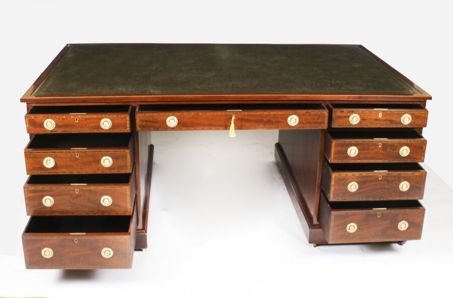 Celebrating the Craftsmanship of Antique Partners Desks
