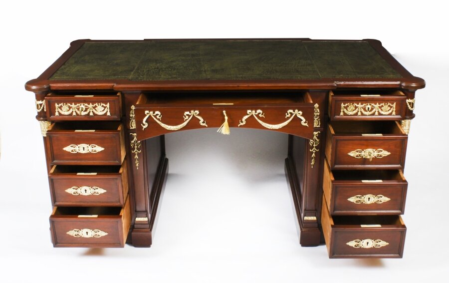 Celebrating the Craftsmanship of Antique Partners Desks
