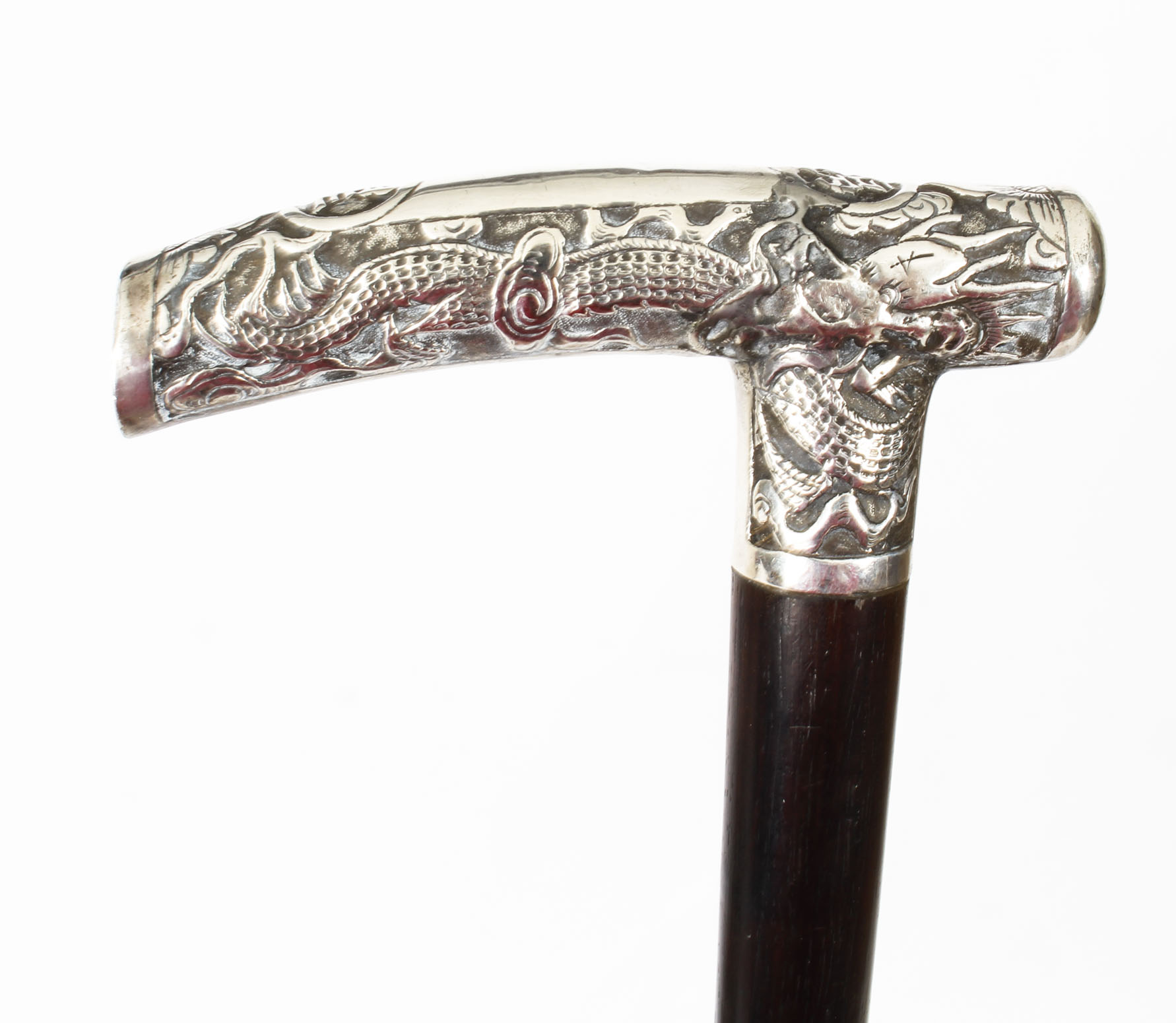 Silver handle walking stick depicting a crescent moon, France 1900.