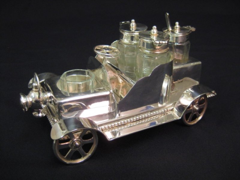https://www.regentantiques.com/product_images/900X600/02873-English-Silver-Plated-Motorcar-Condiment-Cruet-Set-1.jpg